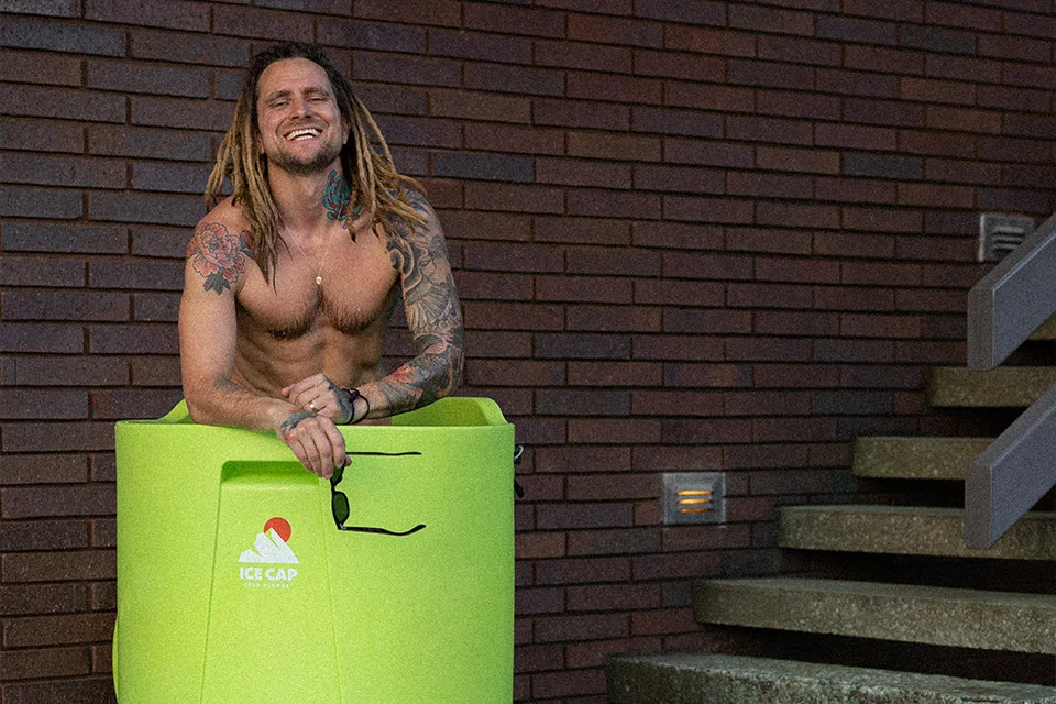 man using cold plunge tub
